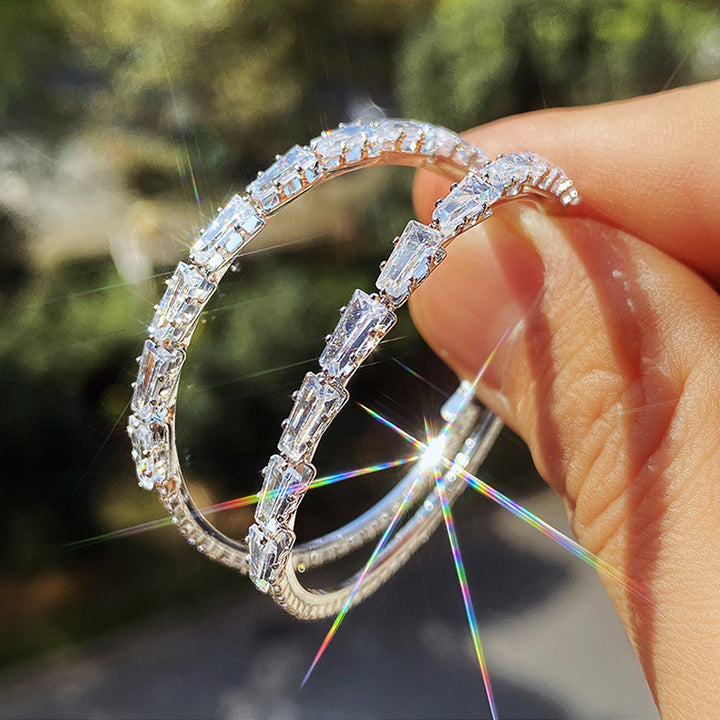 Diamond-studded large hoop earrings