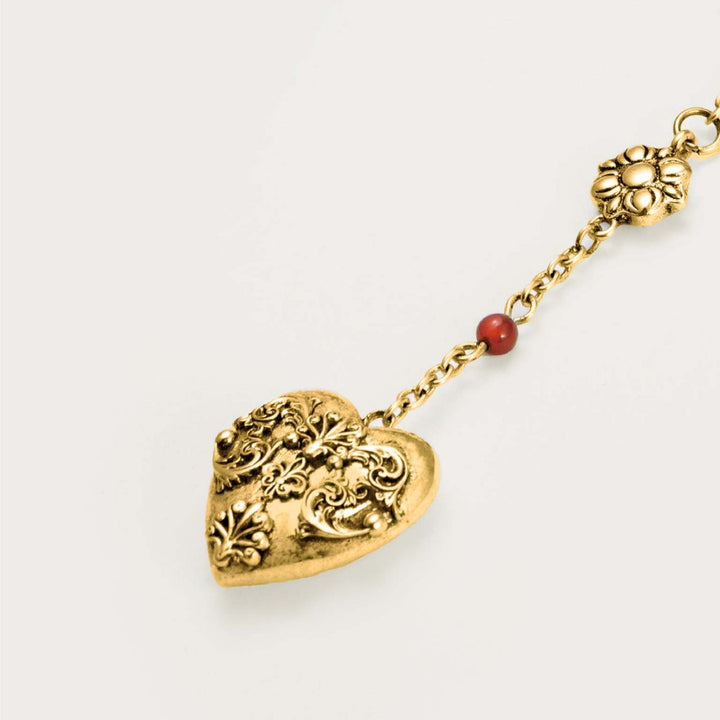 Vintage-style patterned heart pendant