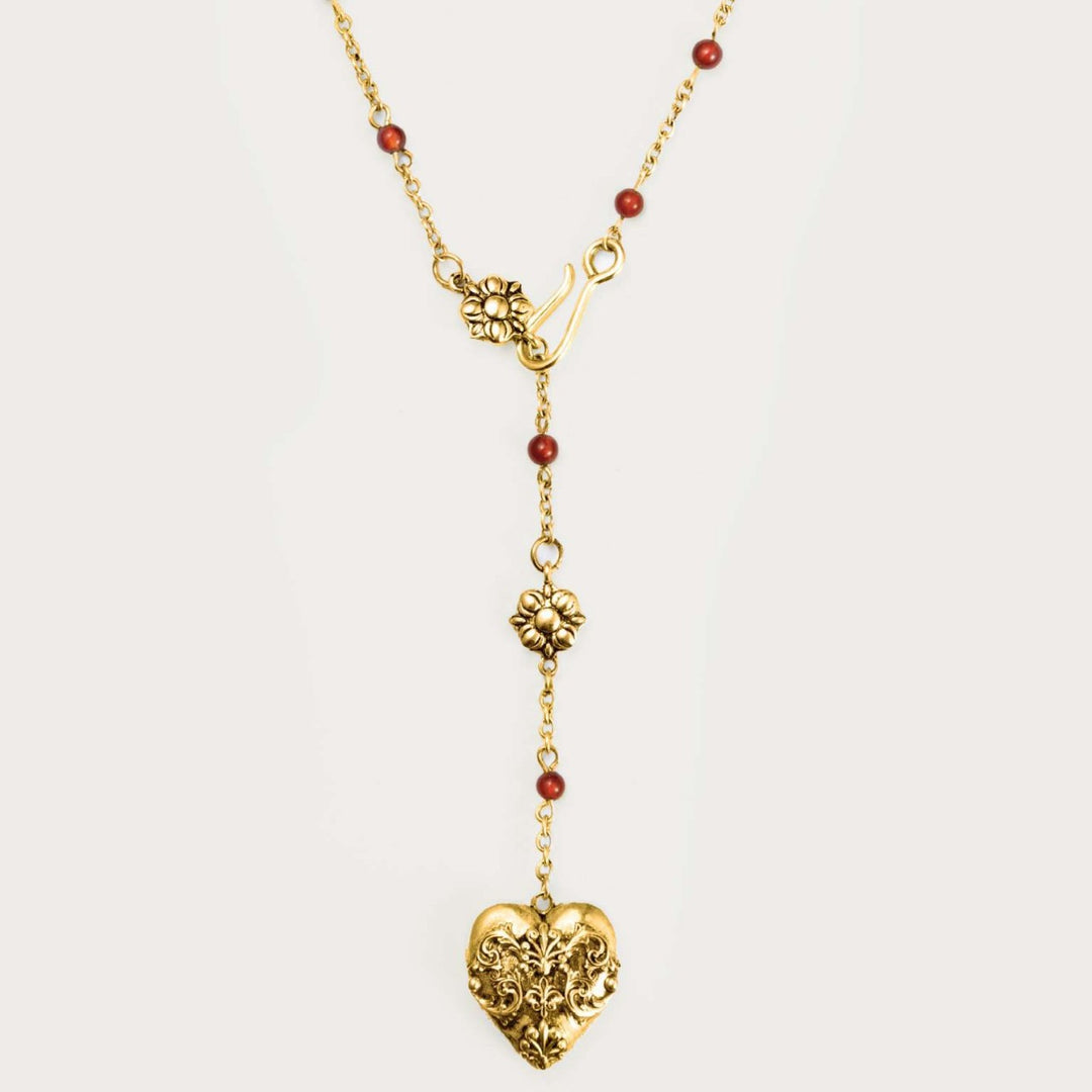 Vintage-style patterned heart pendant
