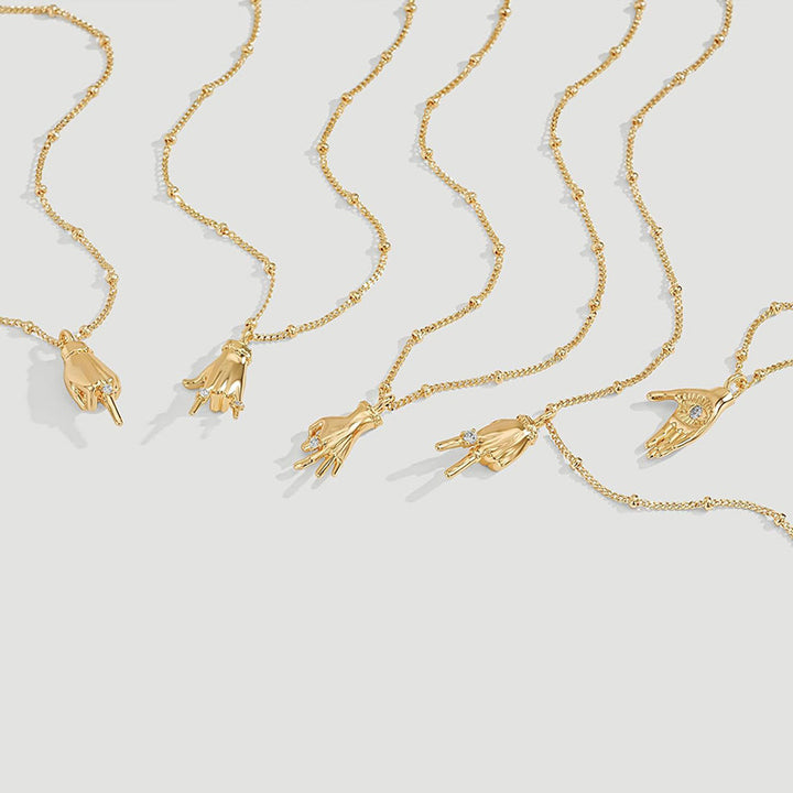 Gold-plated gesture pendant necklace