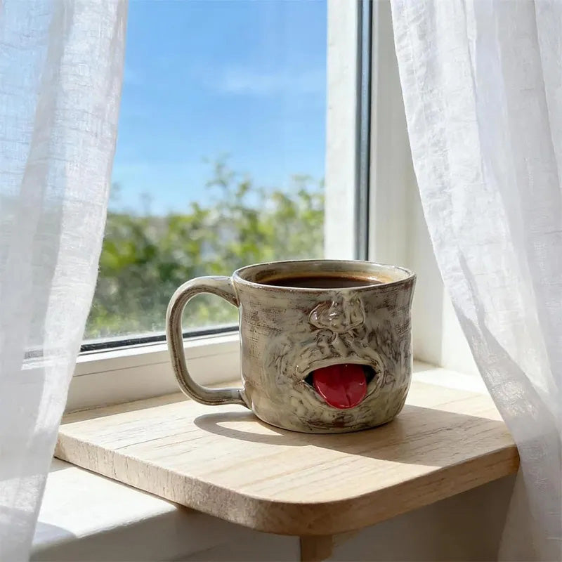 Fun tongue-out ceramic cup