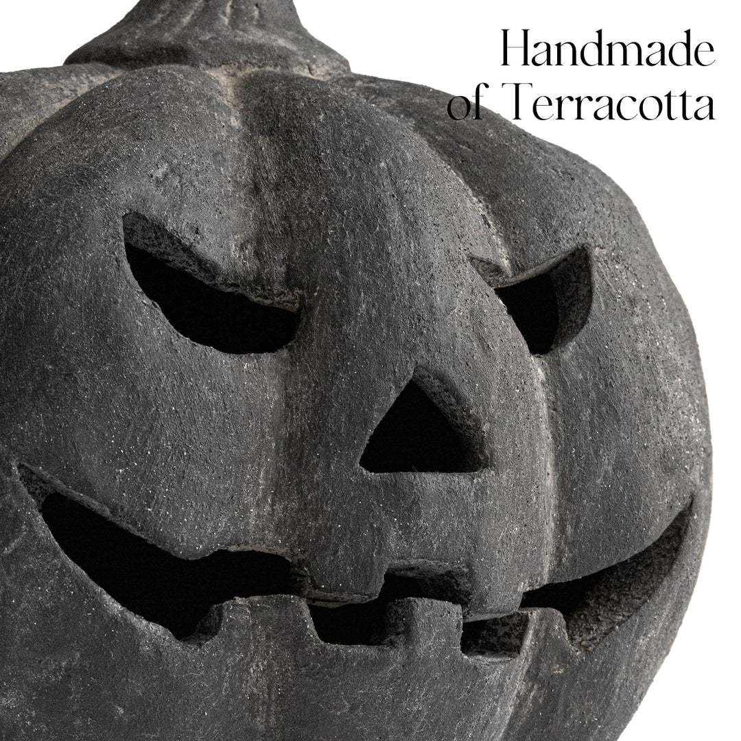Handmade clay pumpkin lantern
