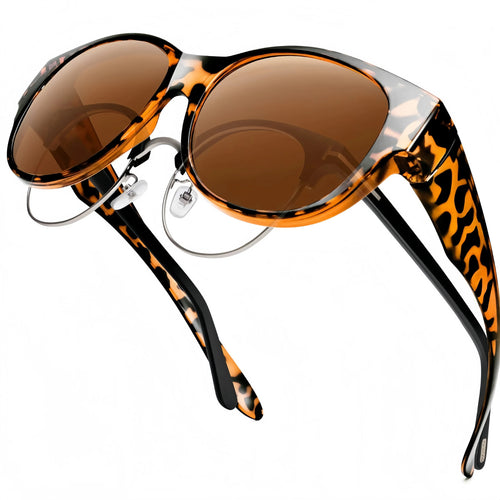 Sunglasses designed to be worn over prescription glasses