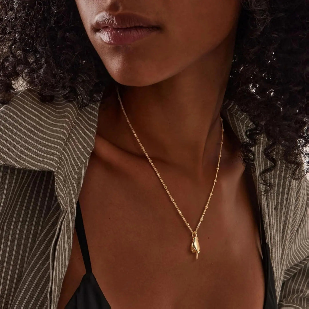 Gold-plated gesture pendant necklace