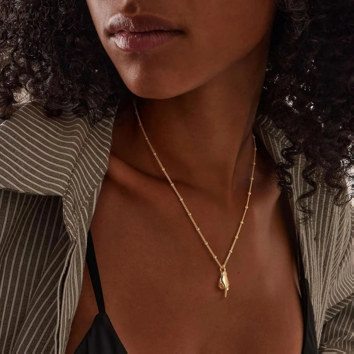 Gold-plated gesture pendant necklace